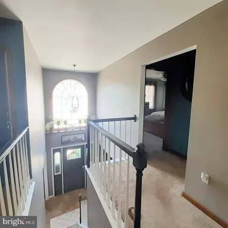 a view of entryway with a front door