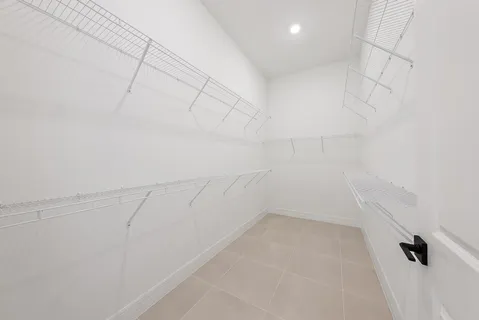 a bathroom with a sink a mirror and a shower