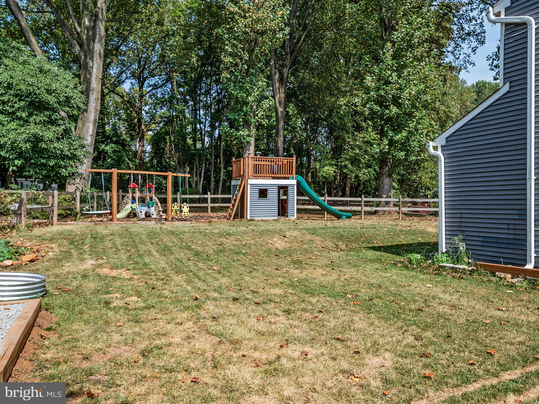 9328 Spring Water Path Jessup, MD 20794 - Photo 36 of 46 Playground swing set in backyard