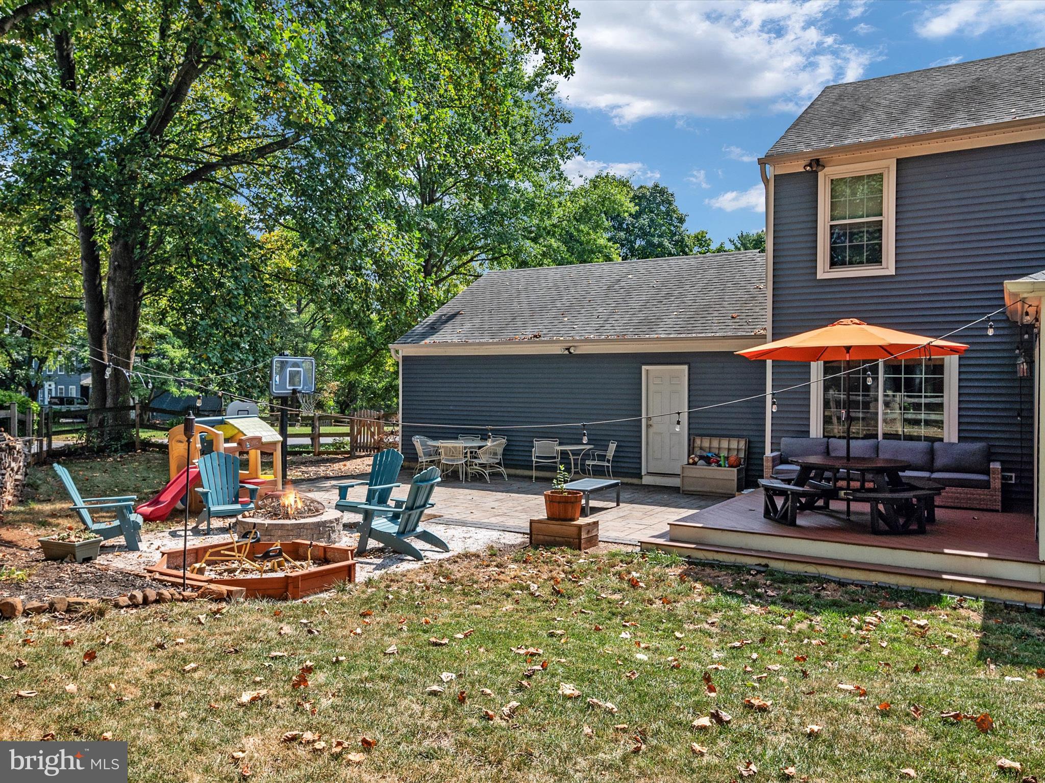 9328 Spring Water Path Jessup, MD 20794 - Photo 38 of 46 Rear Patio, Deck, and Firepit