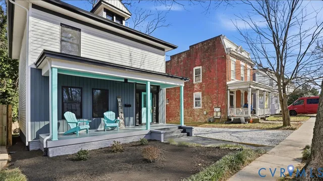 a bedroom with a bed and a walk in closet