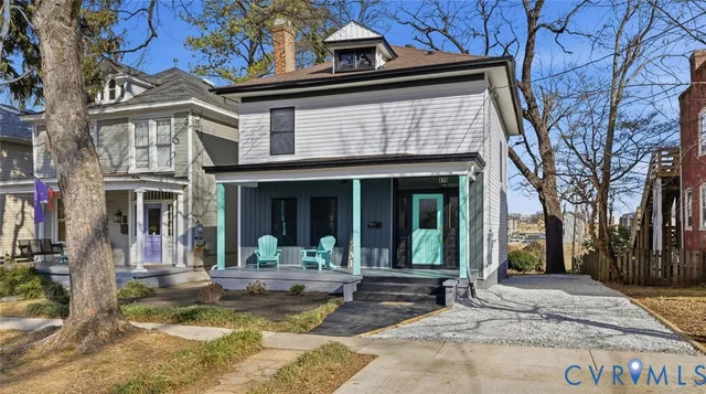 a large white bed in a white room