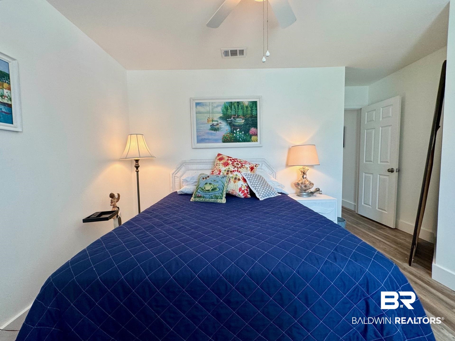 3200 Loop Road, Unit 55 Orange Beach, AL 36561 - Photo 23 of 40 Bedroom featuring ceiling fan and light hardwood / wood-style flooring