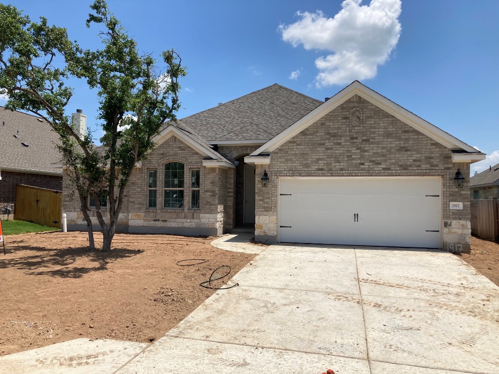 1917 Lakeside Ranch Road Georgetown, TX 78633 - Photo 1 of 1 a view of a backyard of a house
