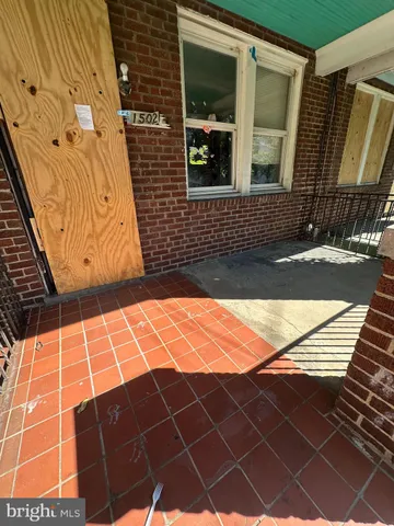 a picture of a bathroom with a sink and mirror