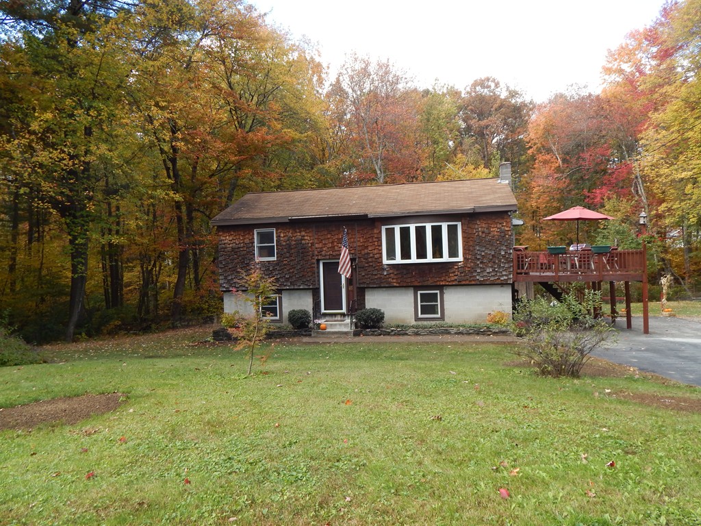 45 Cove Road Lunenburg, MA 01462 - Photo 1 of 24 a view of a house with backyard porch and sitting area