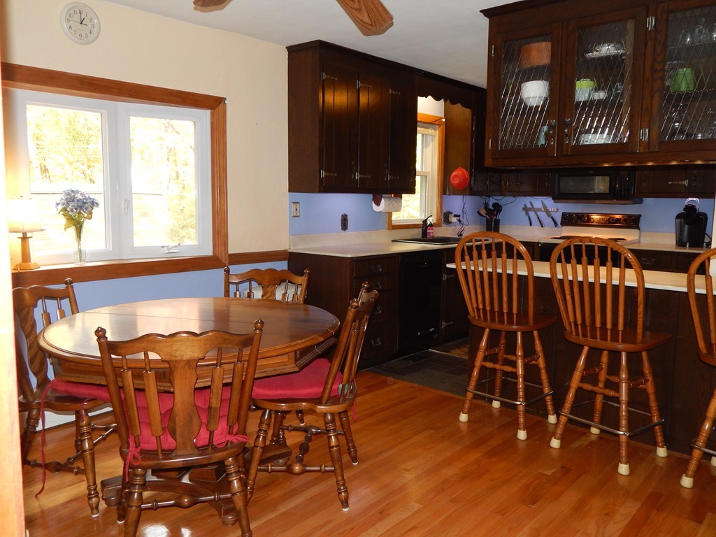 45 Cove Road Lunenburg, MA 01462 - Photo 8 of 24 a view of a dining room with furniture and window