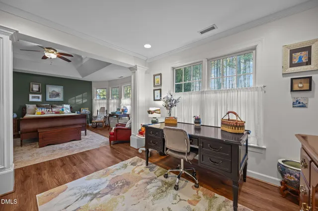a bedroom with furniture and a window