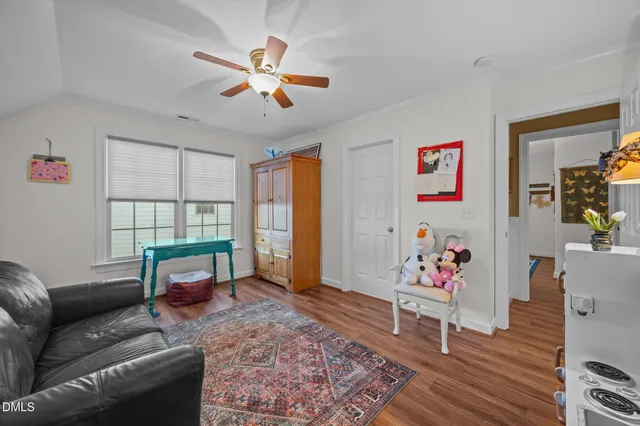 a spacious bathroom with double vanity and a mirror