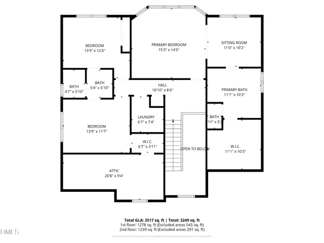 an aerial view of a house with garden space and street view