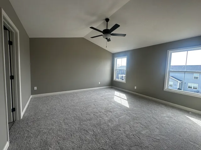 a bathroom with a double vanity sink and mirror