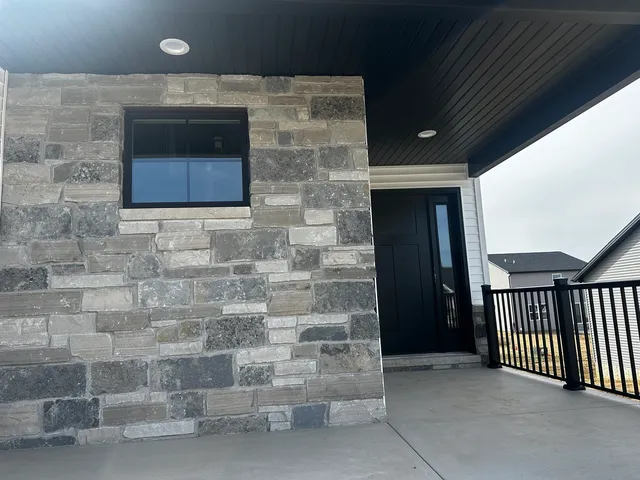 a brick house with a door