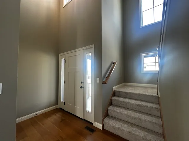 a view of entryway with stairs
