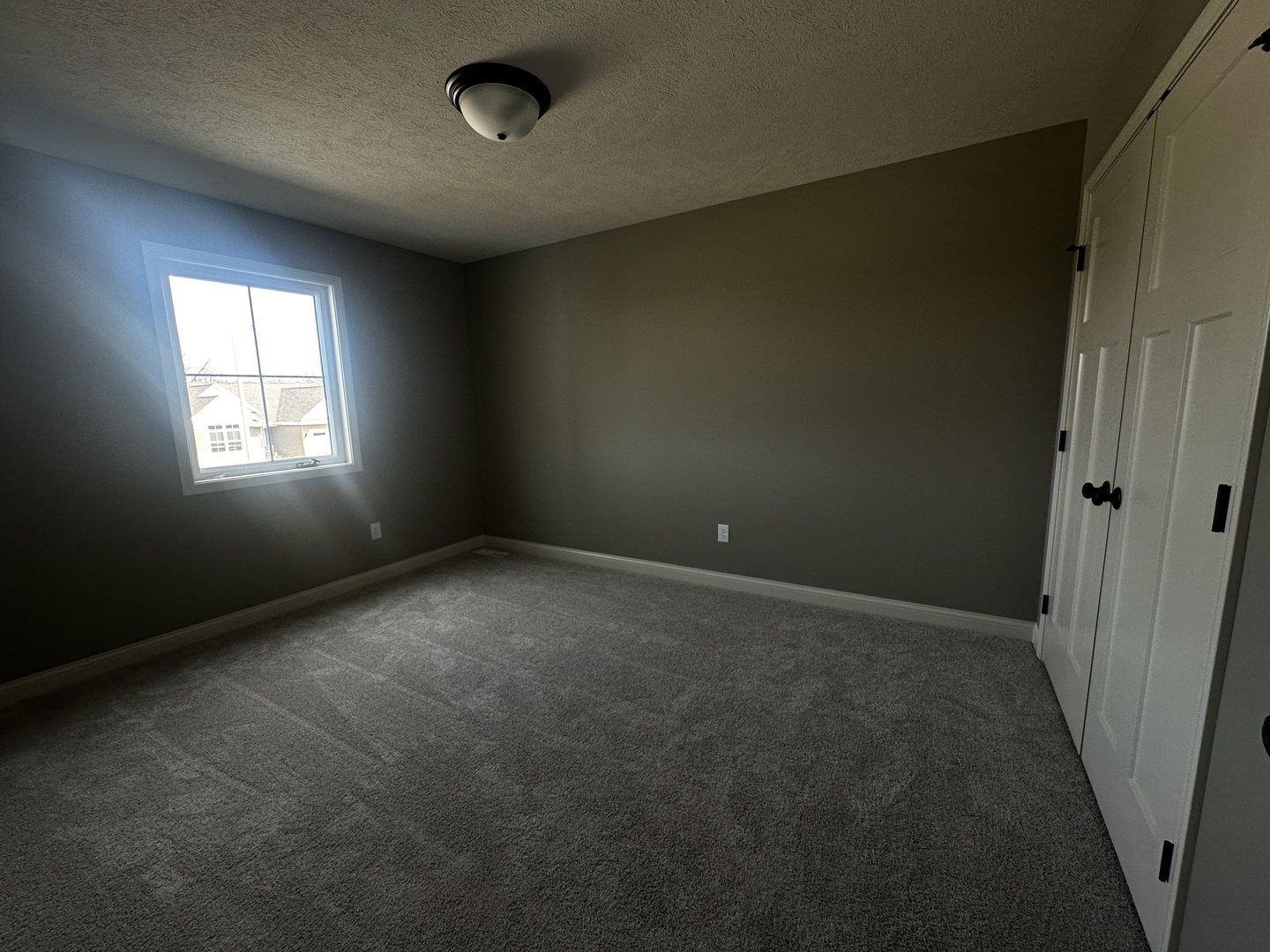 2511 Savanna Road Bloomington, IL 61705 - Photo 10 of 18 an empty room with windows