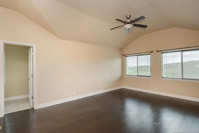 a bathroom with a sink vanity and a mirror