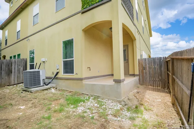 an aerial view of a house with a garden