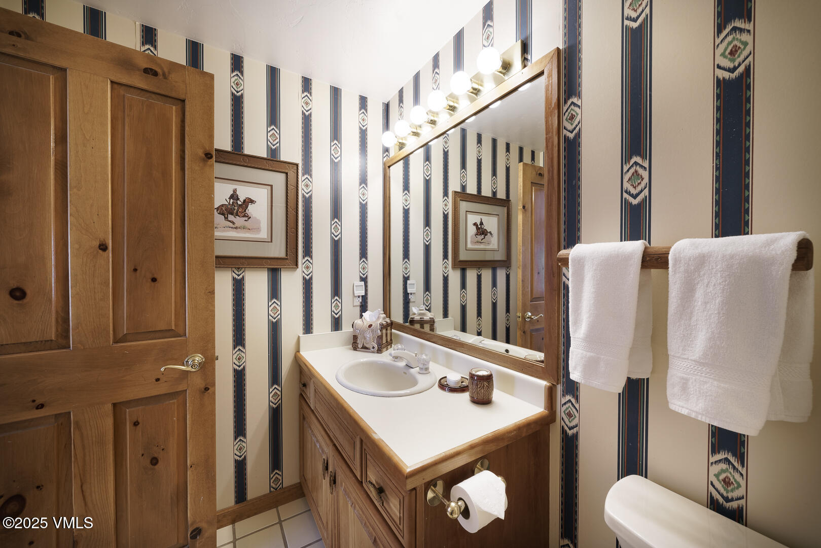 1341 Winslow Road, Unit B Edwards, CO 81632 - Photo 12 of 56 a bathroom with sink a mirror a toilet and a shower