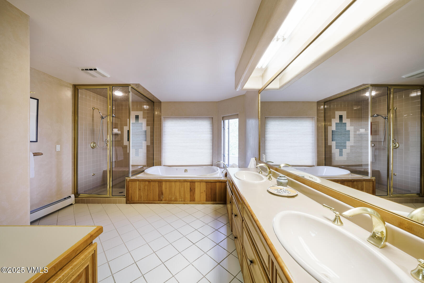 1341 Winslow Road, Unit B Edwards, CO 81632 - Photo 17 of 56 a spacious bathroom with a tub sink and mirror