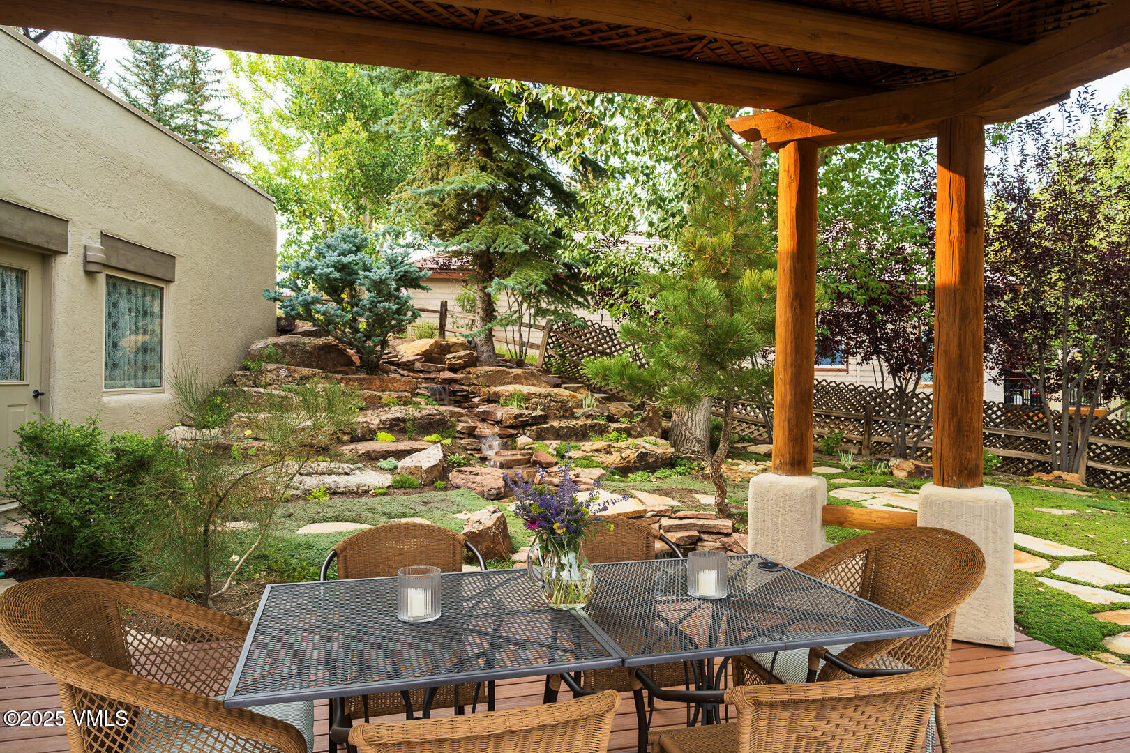 1341 Winslow Road, Unit B Edwards, CO 81632 - Photo 38 of 56 a view of a patio with table and chairs and potted plants