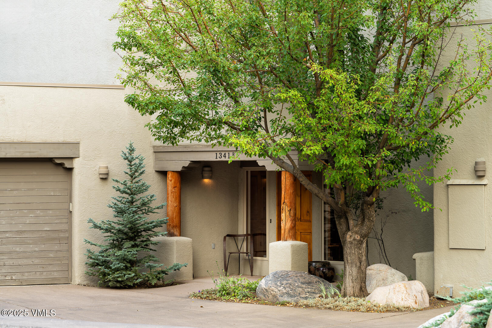 1341 Winslow Road, Unit B Edwards, CO 81632 - Photo 43 of 56 a front view of a house with garden