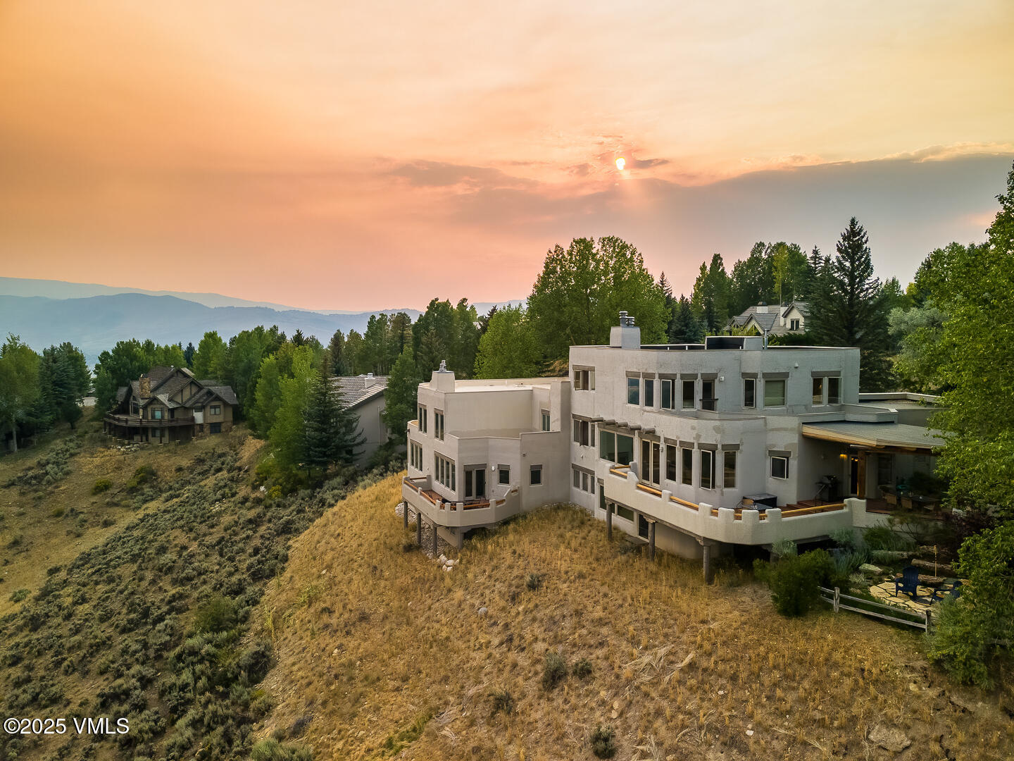 1341 Winslow Road, Unit B Edwards, CO 81632 - Photo 45 of 56 a view of a house with a wooden deck and a lake view