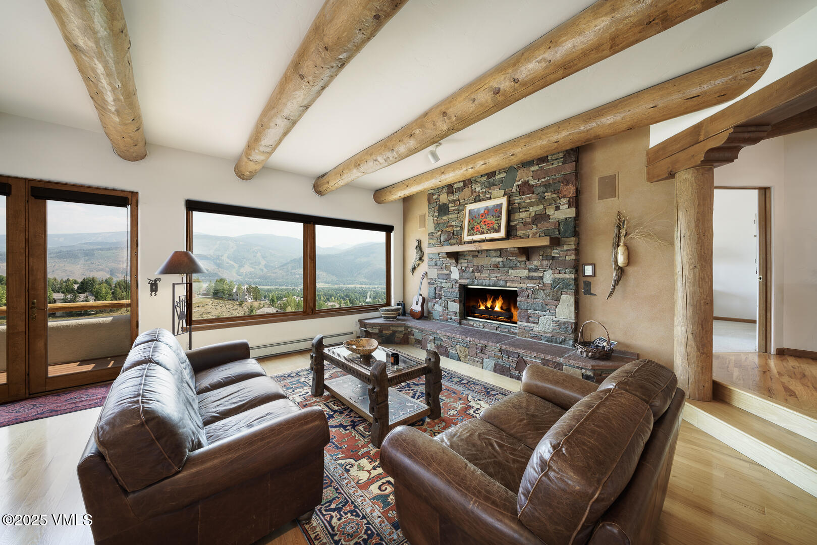 1341 Winslow Road, Unit B Edwards, CO 81632 - Photo 10 of 56 a living room with furniture fireplace and a large window
