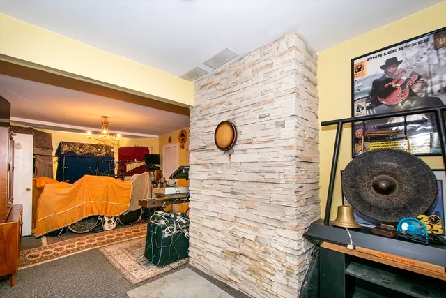 a bedroom with a door and a bed