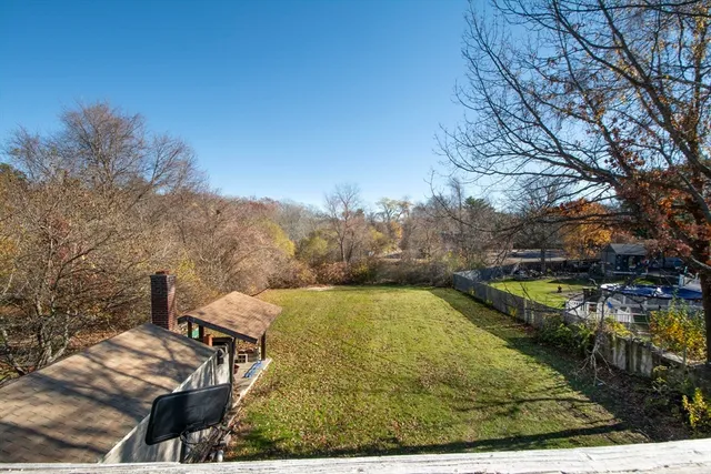 a view of a yard with an outdoor space
