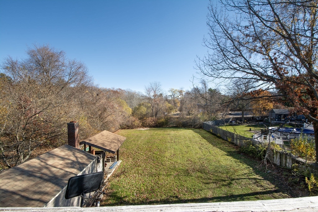 972 Liberty Street Braintree, MA 02184 - Photo 23 of 28 a view of a yard with an outdoor space