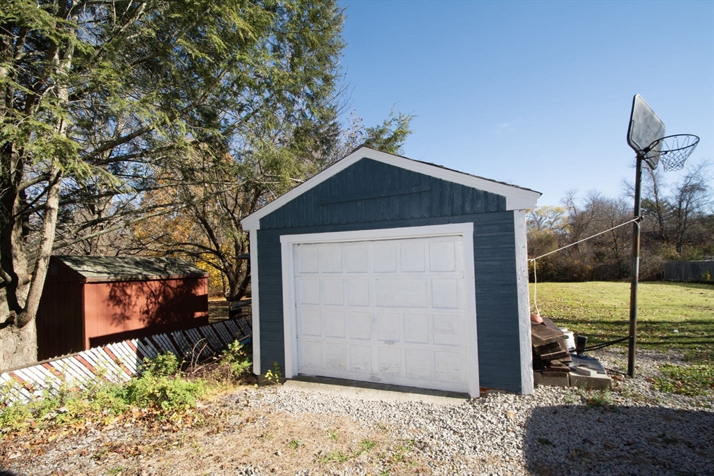972 Liberty Street Braintree, MA 02184 - Photo 26 of 28 a front view of a house with a yard
