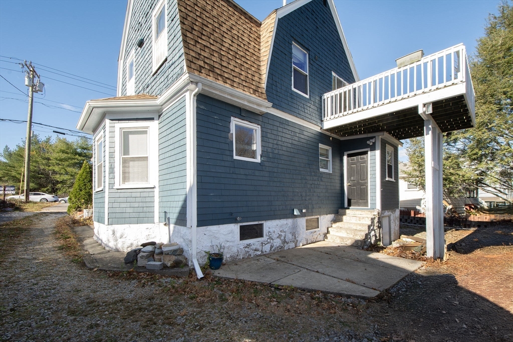 972 Liberty Street Braintree, MA 02184 - Photo 3 of 28 a front view of a house with garden