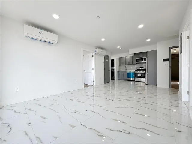 a view of a livingroom with a furniture