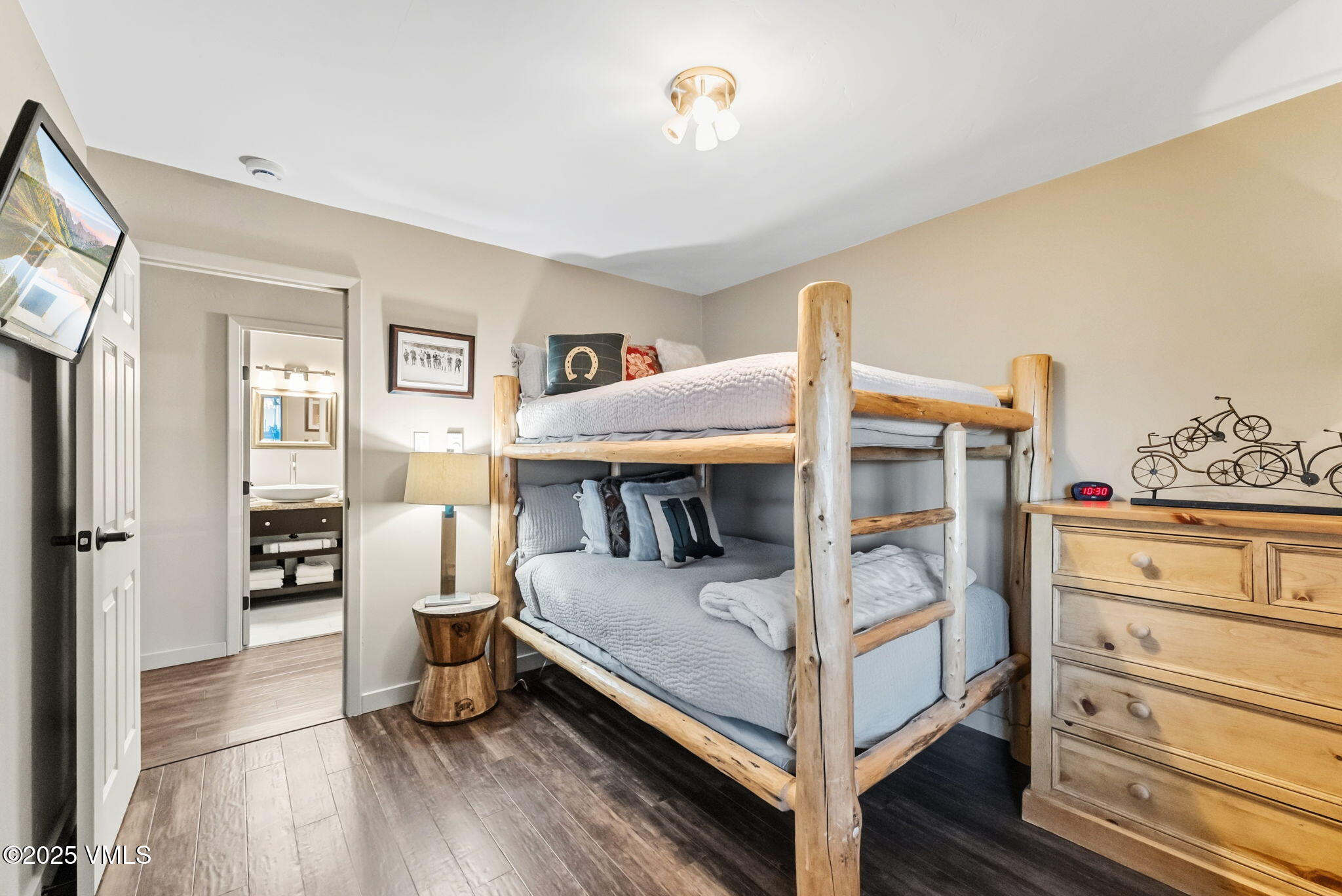 596 Daisy Lane, Unit 10 Avon, CO 81620 - Photo 15 of 34 a bedroom with furniture and white walls