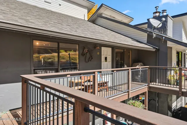 a view of balcony with furniture