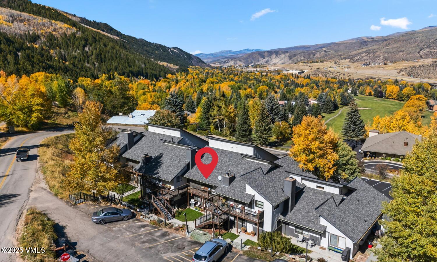 596 Daisy Lane, Unit 10 Avon, CO 81620 - Photo 23 of 34 an aerial view of residential houses with outdoor space