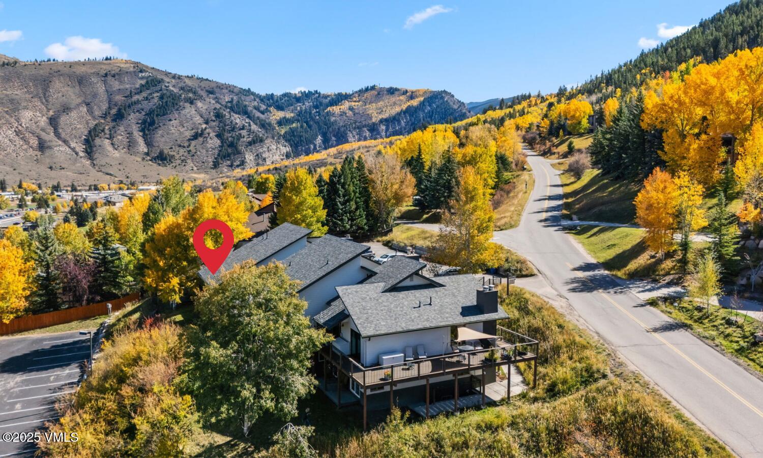 596 Daisy Lane, Unit 10 Avon, CO 81620 - Photo 25 of 34 a view of a swimming pool with a yard