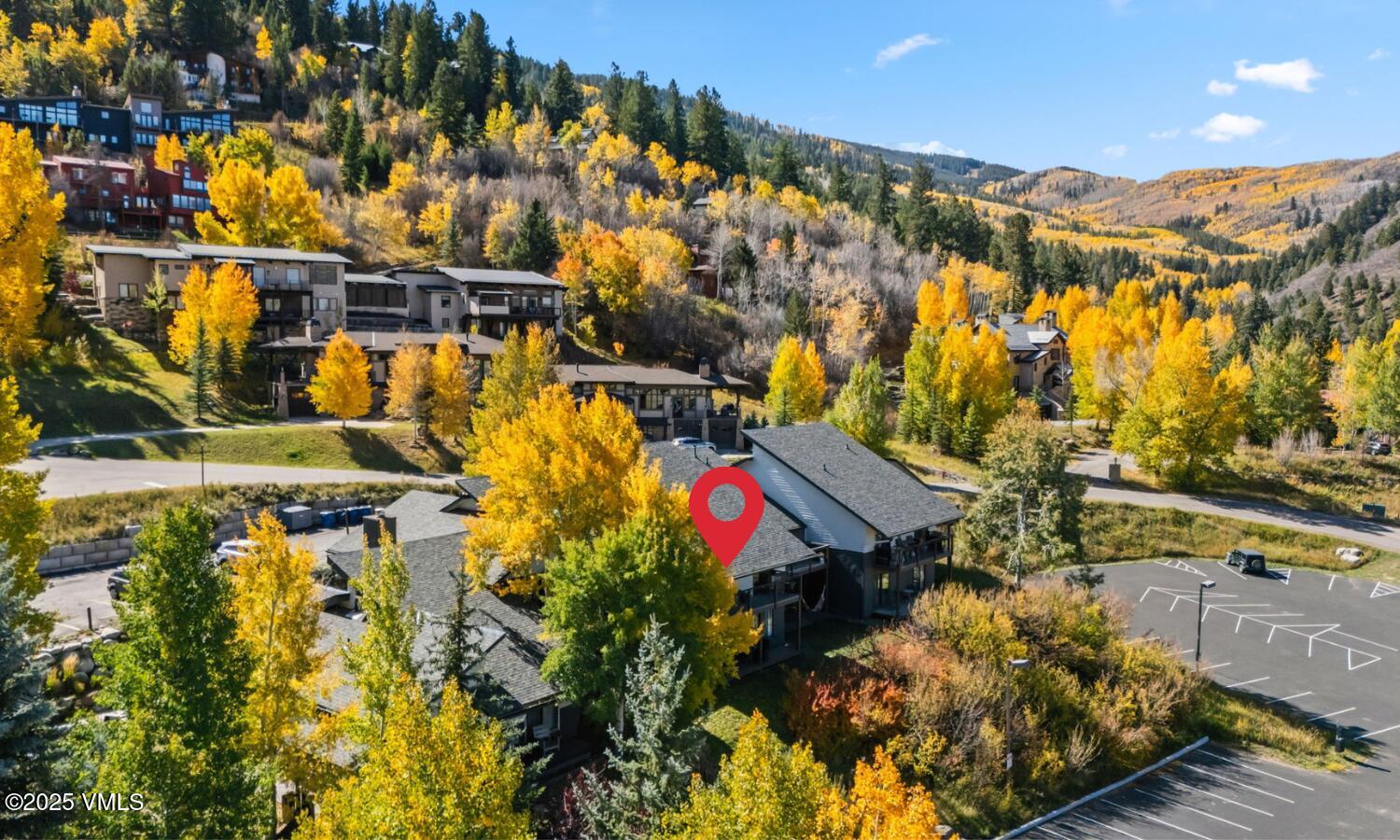 596 Daisy Lane, Unit 10 Avon, CO 81620 - Photo 27 of 34 an aerial view of residential houses with outdoor space