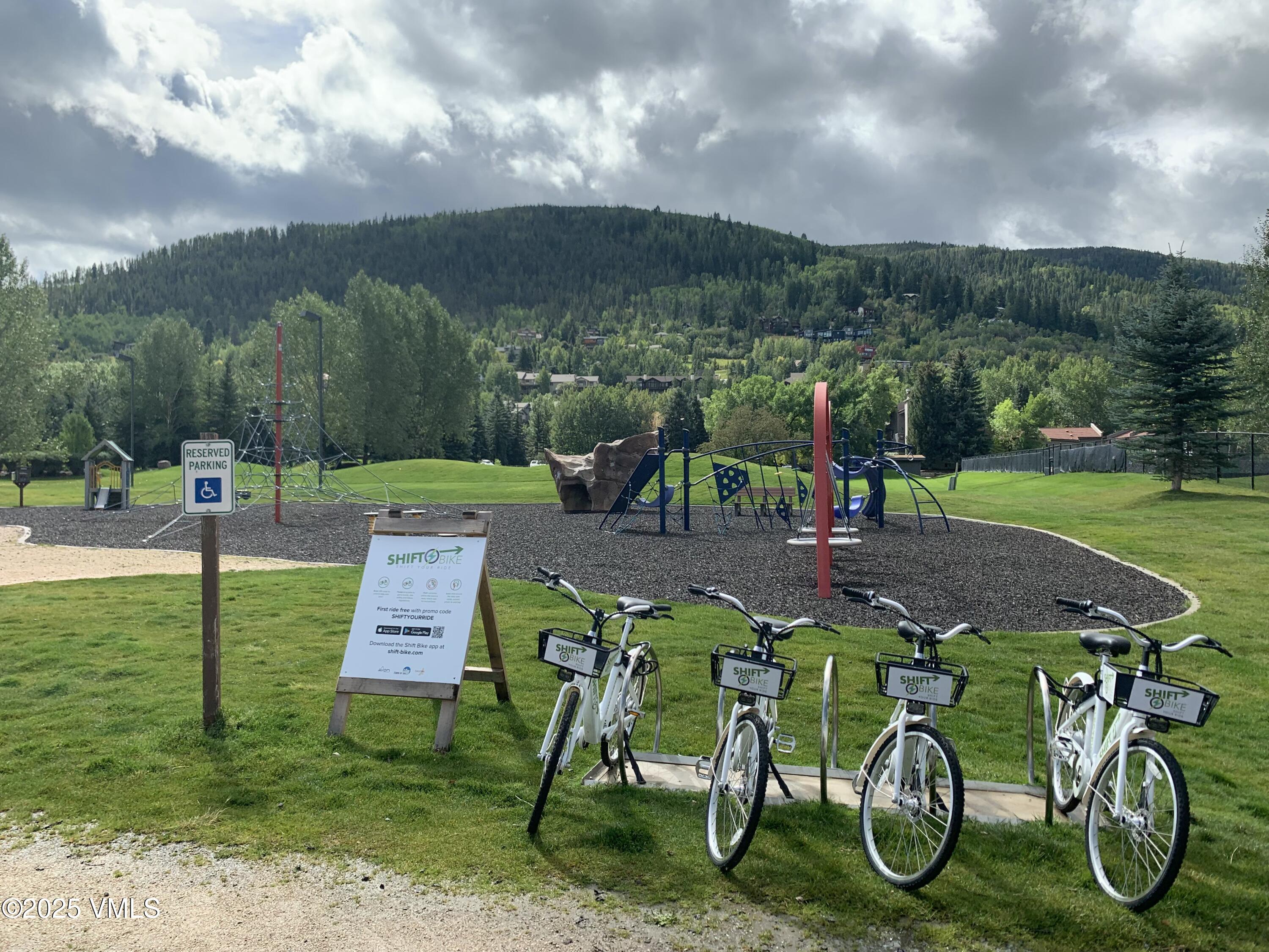 596 Daisy Lane, Unit 10 Avon, CO 81620 - Photo 30 of 34 a view of a table and chairs in the garden