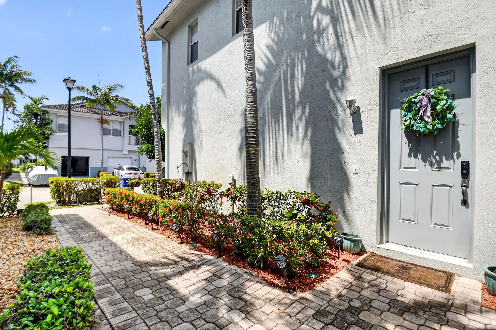 3271 Laurel Ridge Circle Riviera Beach, FL 33404 - Photo 4 of 31 front entrance