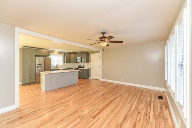 a view of kitchen with wooden floor