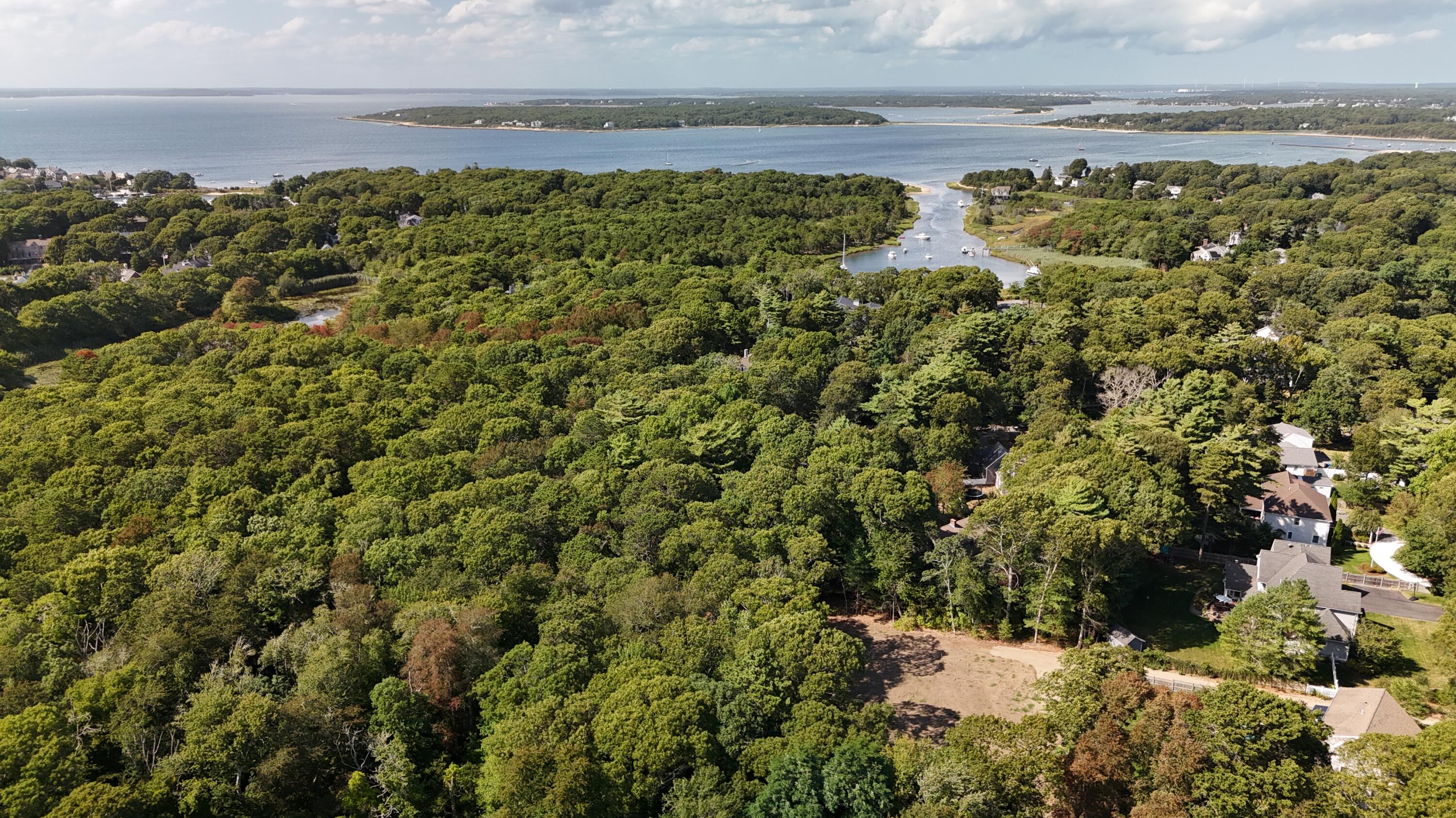 0 Quaker Road North Falmouth, MA 02556 - Photo 1 of 14 a view of a yard with an outdoor space