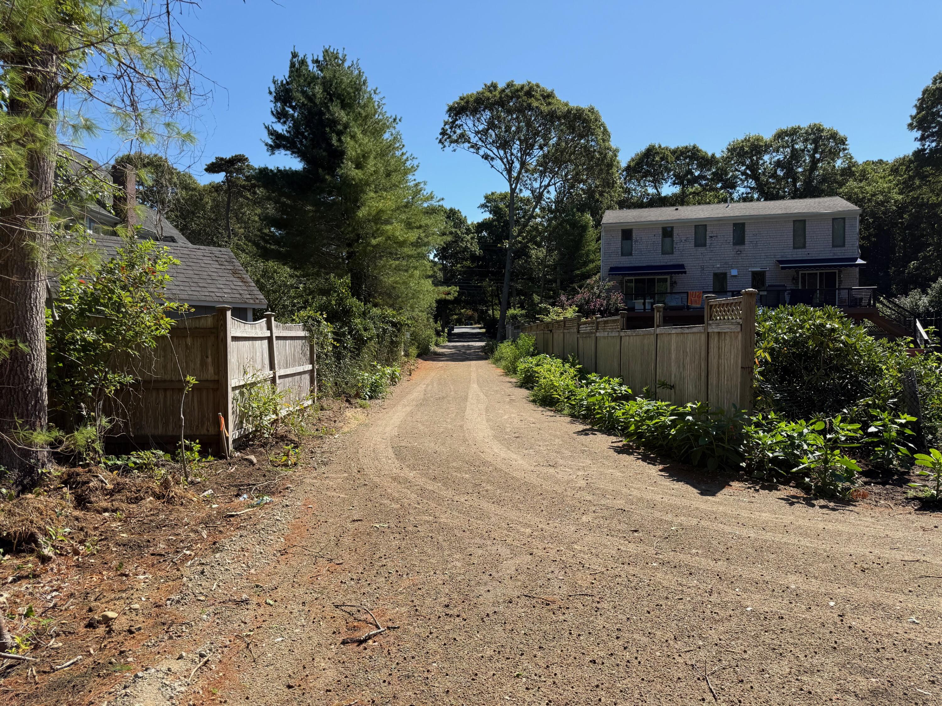 0 Quaker Road North Falmouth, MA 02556 - Photo 9 of 14 a view of a garden with a pathway