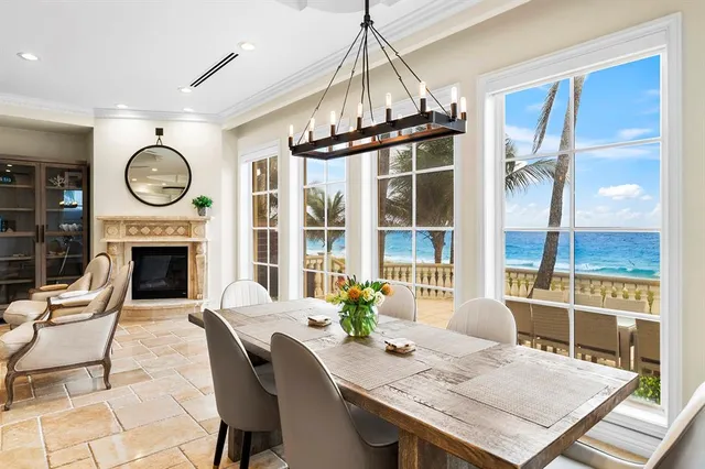 a view of a patio with a table chairs and a table