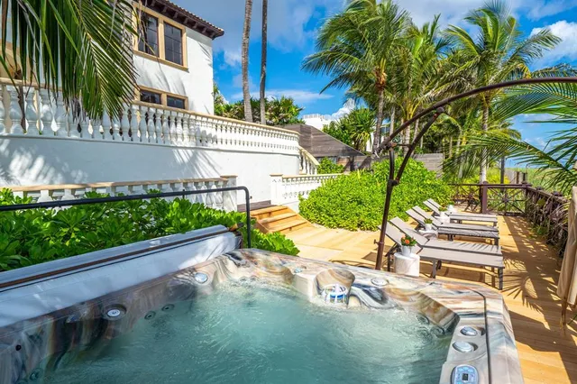 a view of a swimming pool with a patio