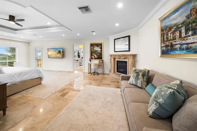 a spacious bathroom with a tub sink and mirror