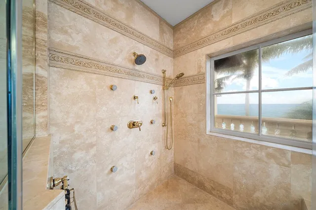 a bathroom with a sink double vanity and a mirror