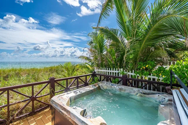 a view of swimming pool from a balcony