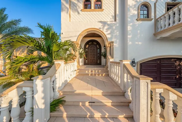 a bathroom with a sink a mirror and a shower
