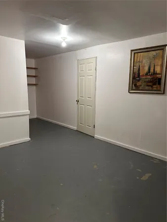 an empty room with a workbench