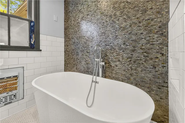 a bathroom with a bathtub
